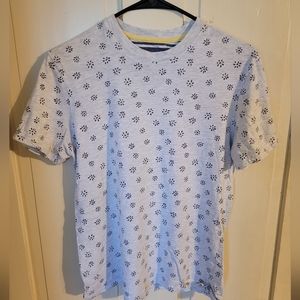 White T with blue flower design. pd&c
